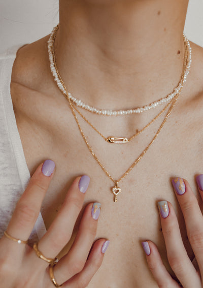 Choker Perlenkette mit Herz Verschluss Vergoldet