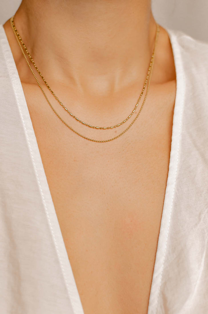 Collar Cadena Abalorio y Barra en Oro