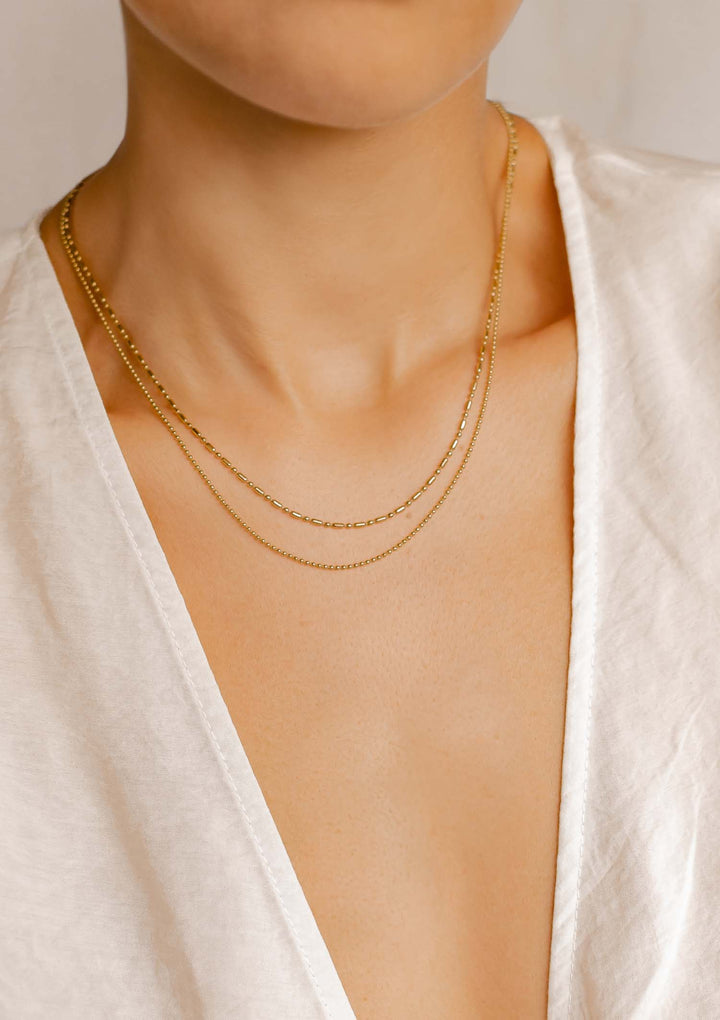 Collar Cadena Abalorio y Barra en Oro