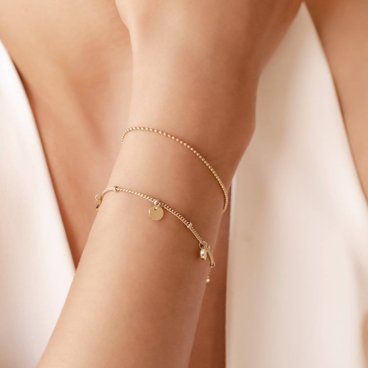 Set Pulseras Moneda y Beads