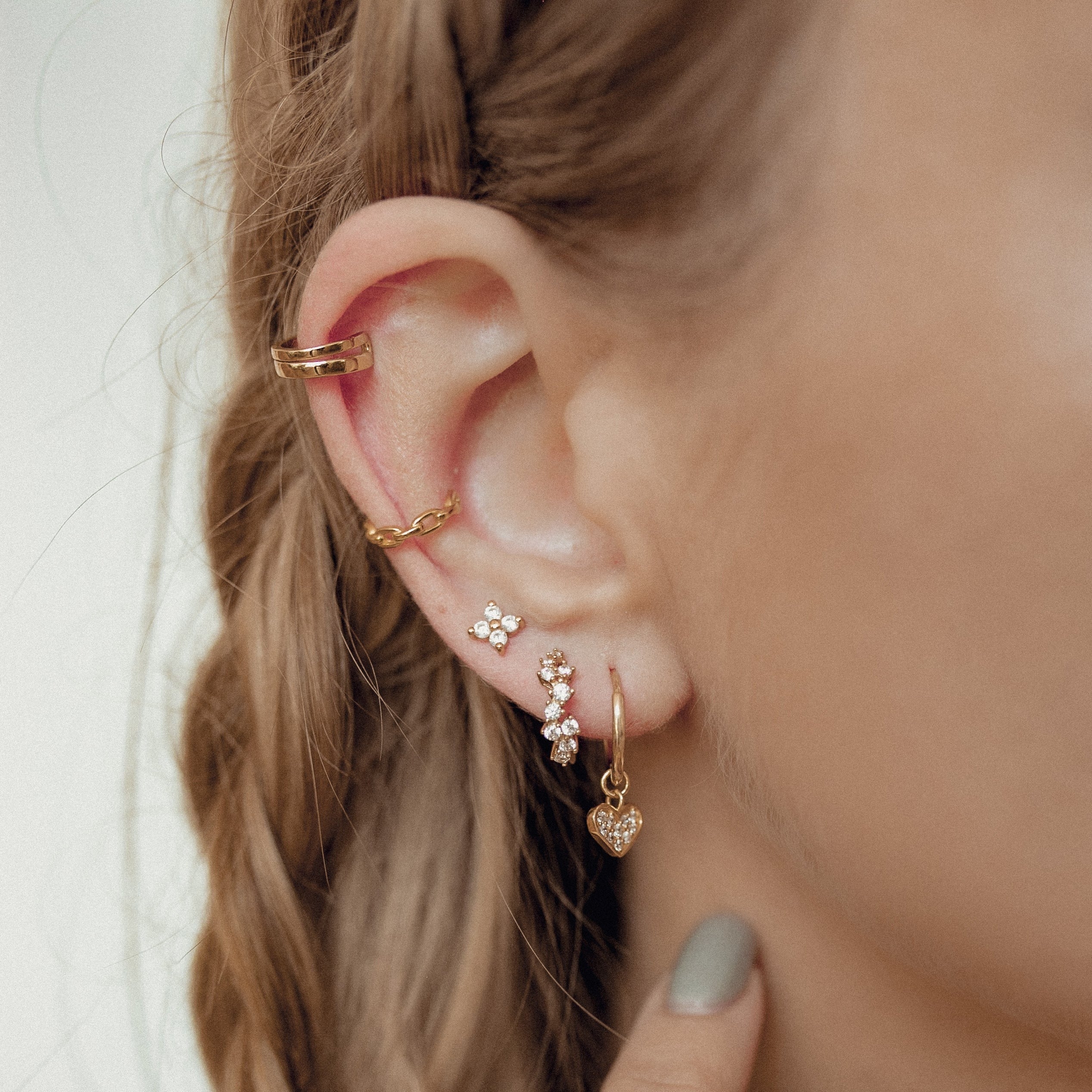Multiple Earring Stack How to Stack Earrings for Multiple Piercings – Hey Happiness