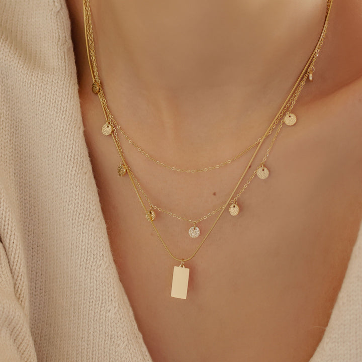 Multi-Strand Layered Necklace Look
