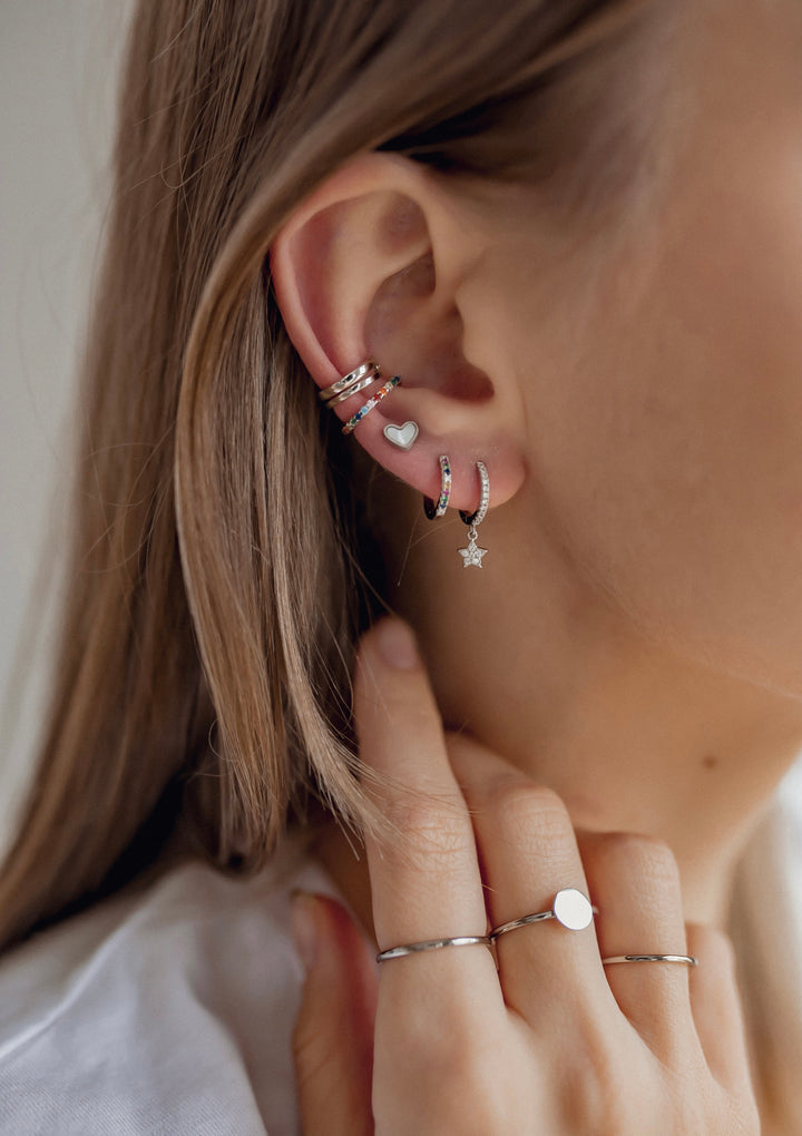 Pendientes Huggie de Estrella Plata de Ley 925