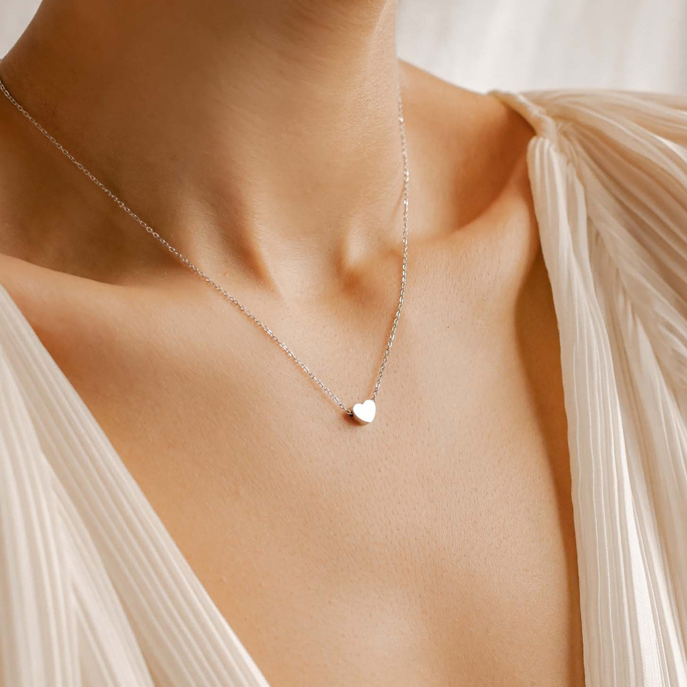 Feine Kette mit Herz Anhänger in Silber