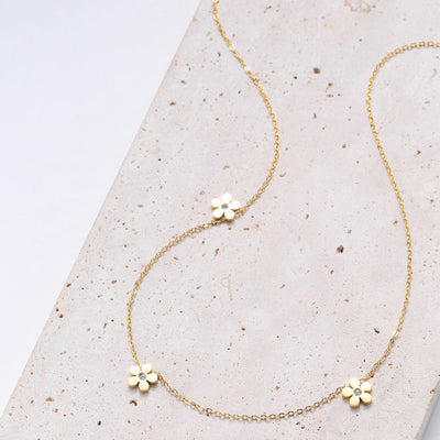 Collar Charm Forget-Me-Not en Oro